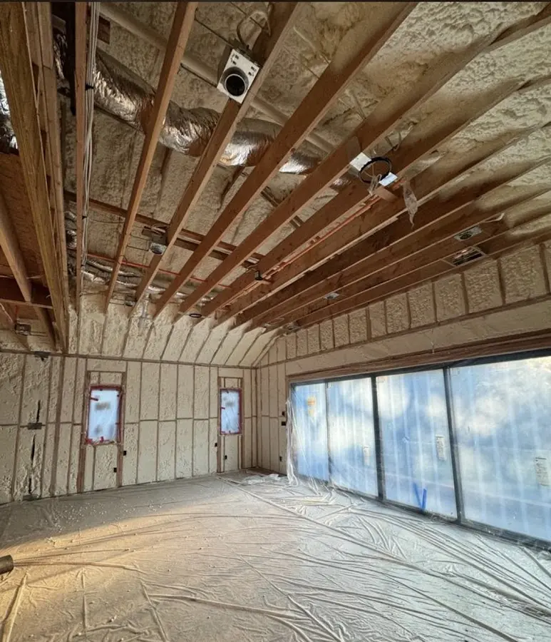 Interior walls and ceiling insulated with spray foam during new construction in Kingsville
